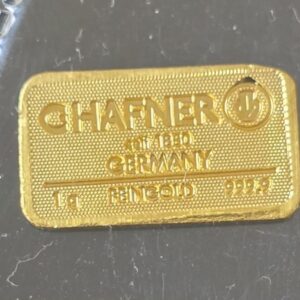 1 gram goud.